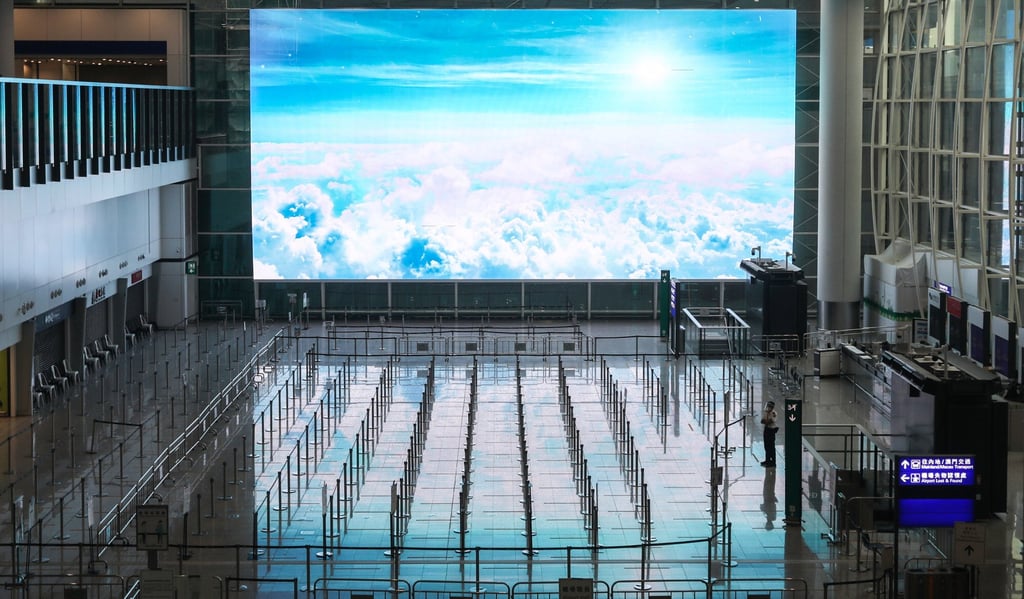A waiting area for passengers heading to quarantine in the arrivals hall in Hong Kong International Airport. SCMP/Yik Yeung-man A waiting area for passengers heading to quarantine in the arrivals hall in Hong Kong International Airport. SCMP/Yik Yeung-man