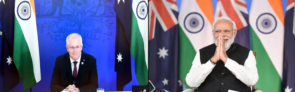 Australian Prime Minister Scott Morrison (L) and Indian Prime Minister Narendra Modi holding a virtual summit on Monday. Photo: via AP