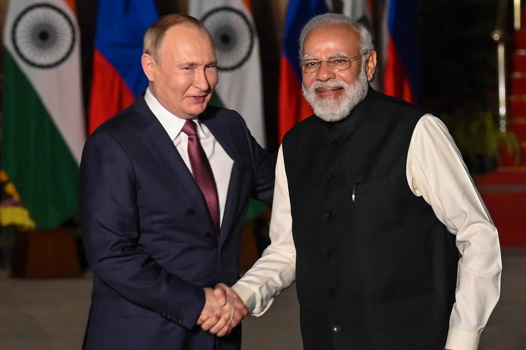 Indian Prime Minister Narendra Modi greets Russian President Vladimir Putin before a December meeting in New Delhi. Photo: AFP via Getty Images/TNS