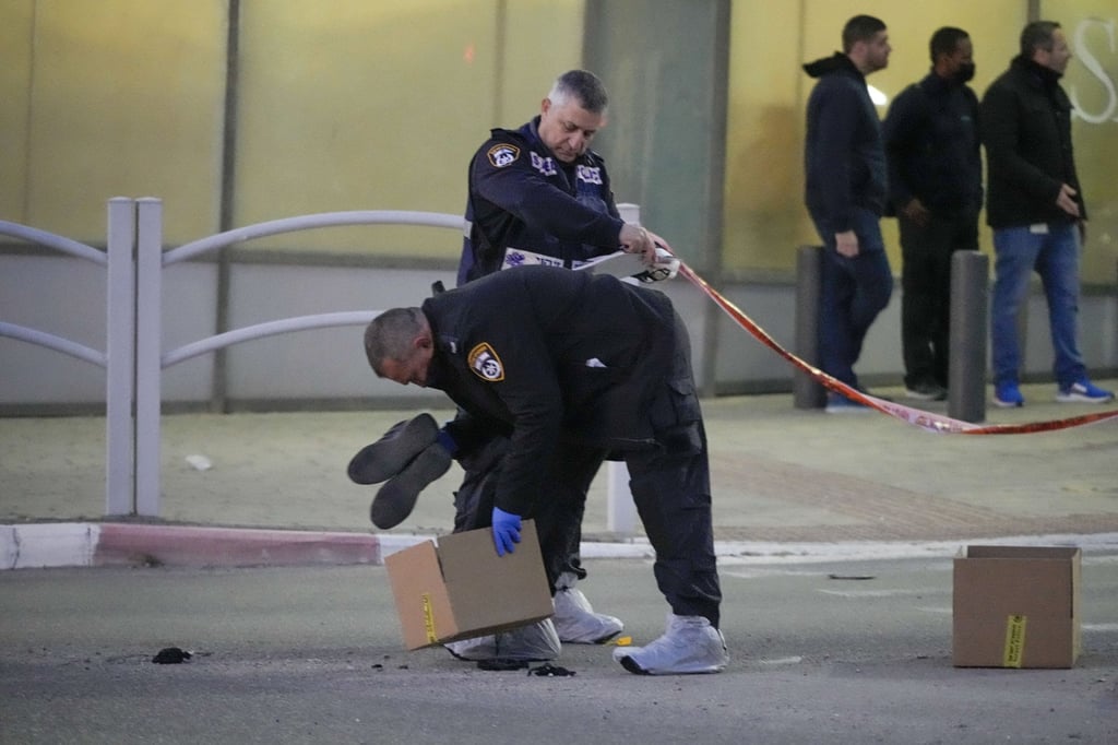 Police at the scene of the attack. Photo: AP