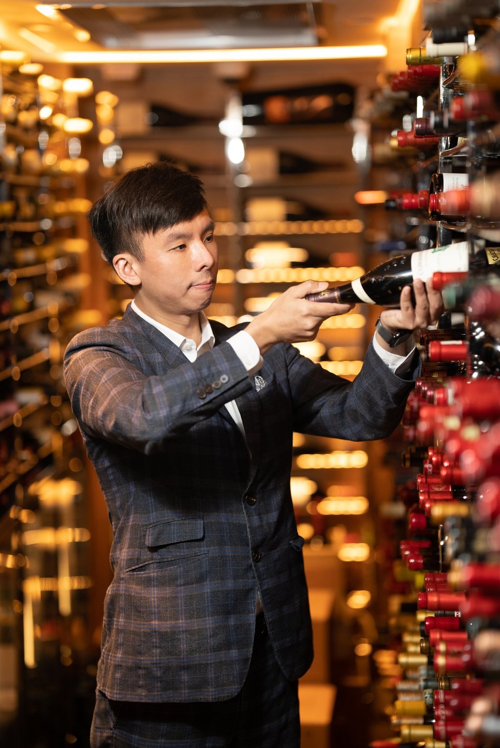 Jim Leung, assistant head sommelier at Amber, created a wine list that caters to diners looking to try different styles. Jim Leung, assistant head sommelier at Amber, created a wine list that caters to diners looking to try different styles.