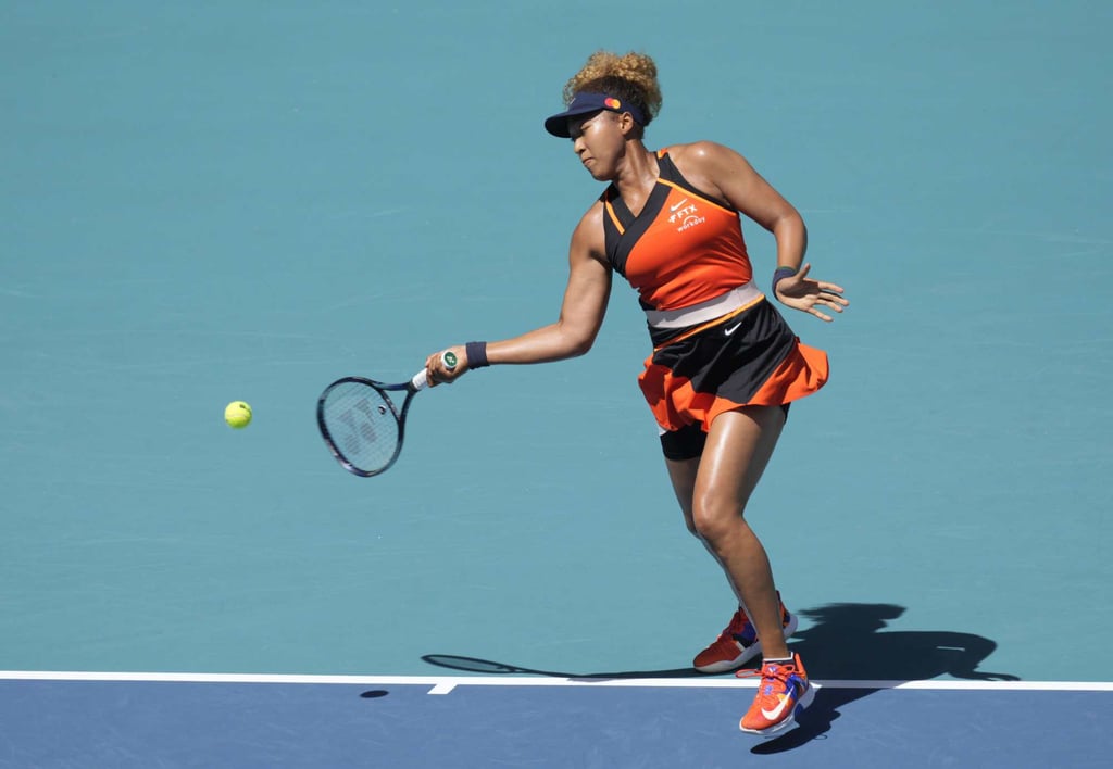 Naomi Osaka returns a shot to Astra Sharma during the 2022 Miami Open. Photo: AFP