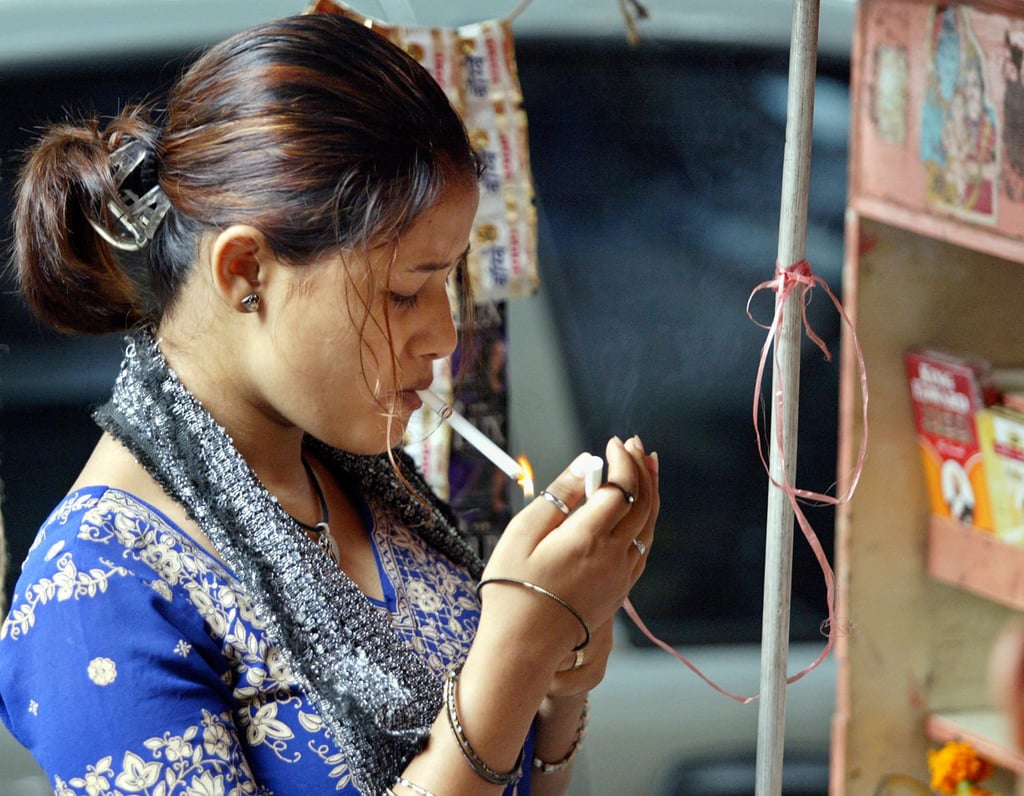 More women are smoking as India liberalises. Photo: Reuters More women are smoking as India liberalises. Photo: Reuters