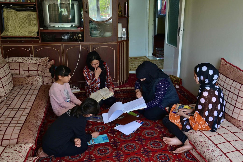 Girls in Kabul study at home after Taliban staged a U-turn about allowing Afghan girls back to school. Photo: AFP Girls in Kabul study at home after Taliban staged a U-turn about allowing Afghan girls back to school. Photo: AFP