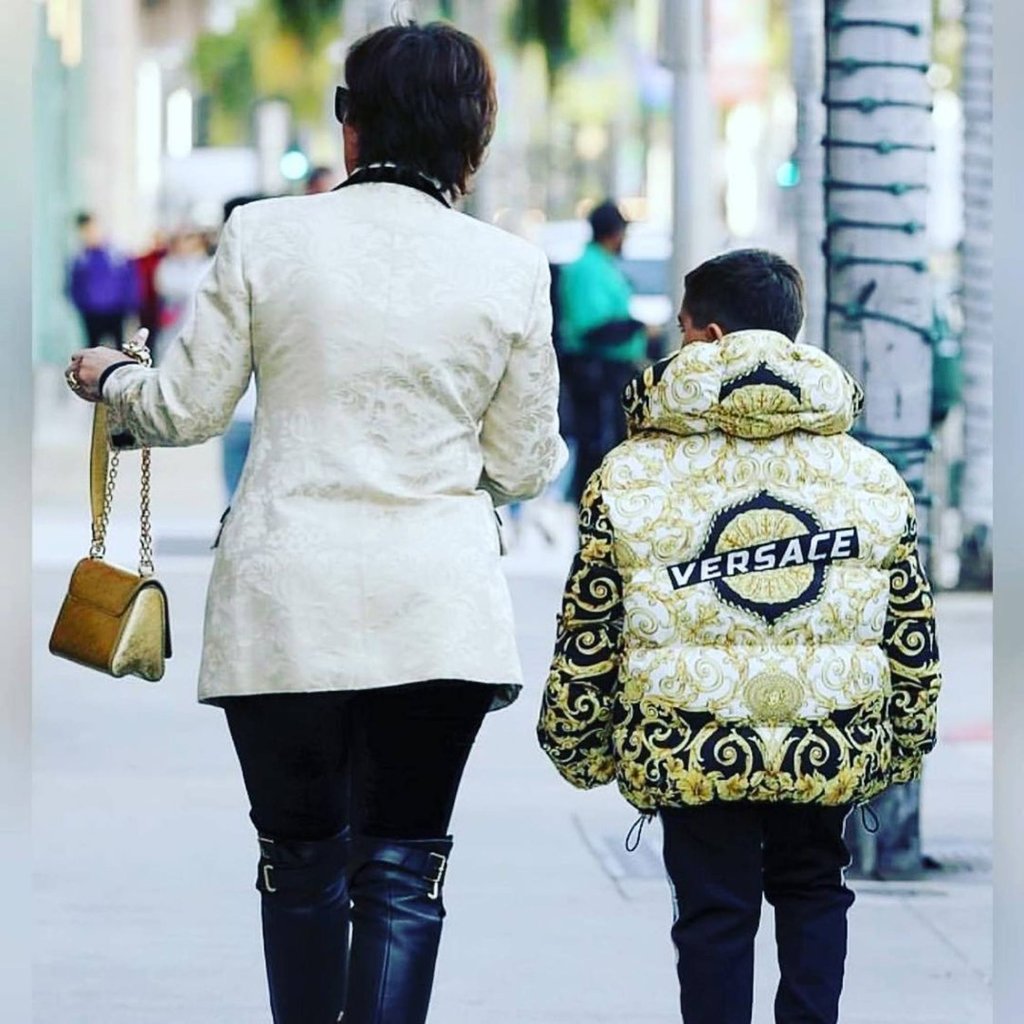 Grandmother Kris Jenner matching with Mason in Versace. Photo: @letthelordbewithyou/Instagram