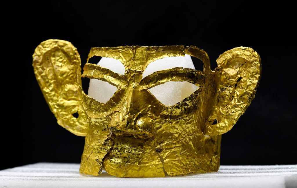 Archaeologists discovered beautiful gold masks in Sanxingdui that they believe are around 3,000 years old. Photo: Xinhua