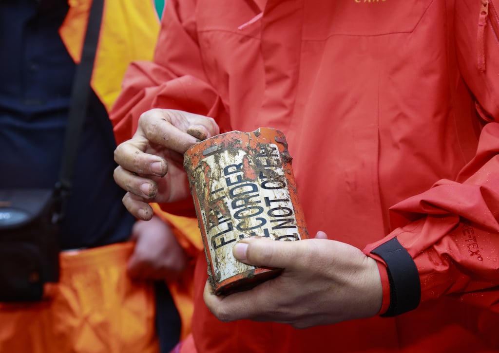 One of the two black boxes of the crashed plane is recovered in Teng county, south China’s Guangxi Zhuang autonomous region, on Wednesday. Photo: Xinhua One of the two black boxes of the crashed plane is recovered in Teng county, south China’s Guangxi Zhuang autonomous region, on Wednesday. Photo: Xinhua