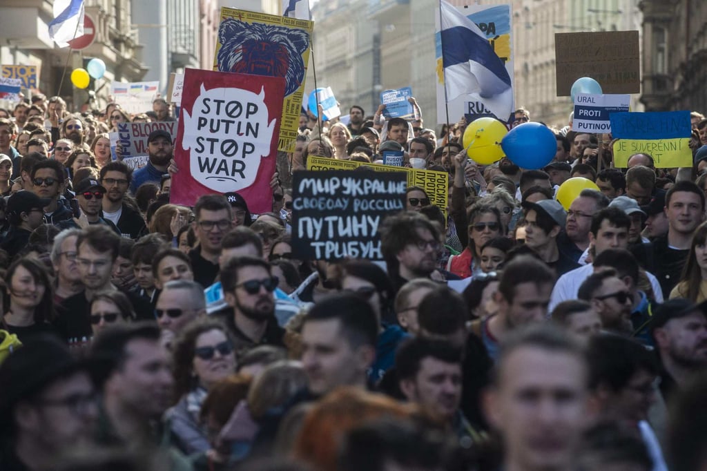 Members of Prague’s Russian community take part in an anti-war demonstration in Prague, Czech Republic on March 26. Photo: AFP