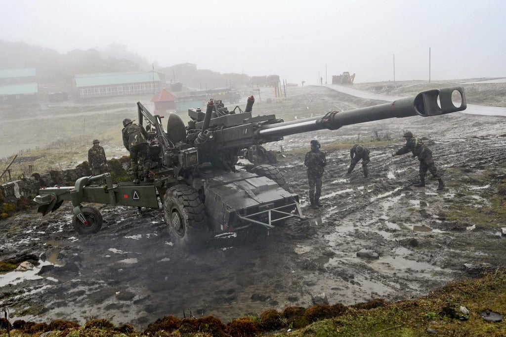 Indian soldiers position an anti-aircraft gun in Arunachal Pradesh state last year near the Line of Actual Control with neighbouring China. Photo: AFP