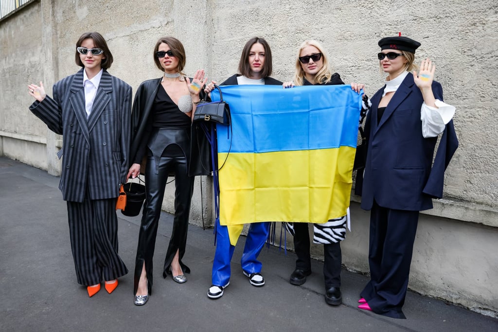 Models demonstrate solidarity with Ukraine outside the Prada fashion show during Milan Fashion Week. Photo: DPA Models demonstrate solidarity with Ukraine outside the Prada fashion show during Milan Fashion Week. Photo: DPA
