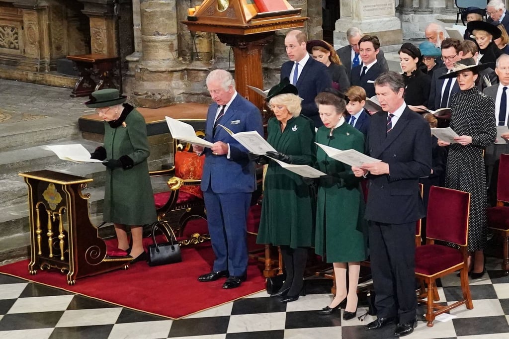 Britain’s Queen Elizabeth (L), and front row (L to R) Britain’s Prince Charles, Prince of Wales, Britain’s Camilla, Duchess of Cornwall, Britain’s Princess Anne, Princess Royal, and Vice Admiral Timothy Laurence, with second row (L to R) Britain’s Prince William, Duke of Cambridge, Britain’s Prince George of Cambridge and Britain’s Catherine, Duchess of Cambridge, attend a Service of Thanksgiving for Britain’s Prince Philip, Duke of Edinburgh on Tuesday. Photo: Pool/AFP