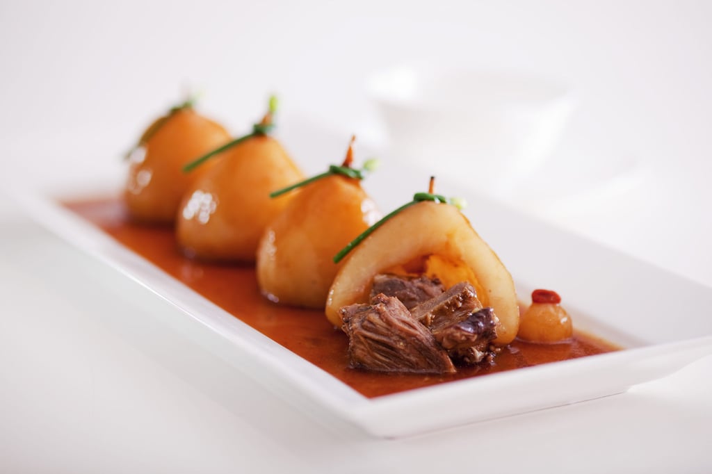 Braised beef brisket stuffed in pear. Photo: Hoi King Heen Braised beef brisket stuffed in pear. Photo: Hoi King Heen