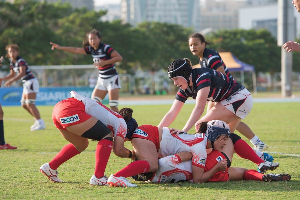 Hong Kong’s Rosie Wright competes for the ball during her side’s game against Japan at the Asia Rugby Sevens Series in Dubai. Photo: HKRU