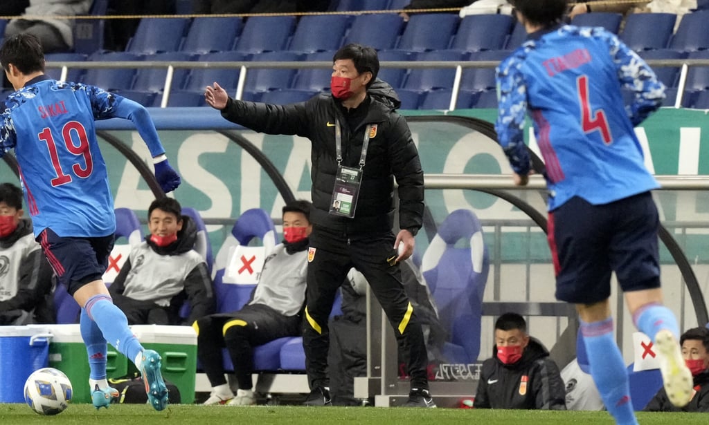 China’s coach Li Xiaopeng (centre) sends his team instructions in a World Cup 2022 event Asian group qualifying game against Japan at the Saitama Stadium in Tokyo. Photo: AP China’s coach Li Xiaopeng (centre) sends his team instructions in a World Cup 2022 event Asian group qualifying game against Japan at the Saitama Stadium in Tokyo. Photo: AP