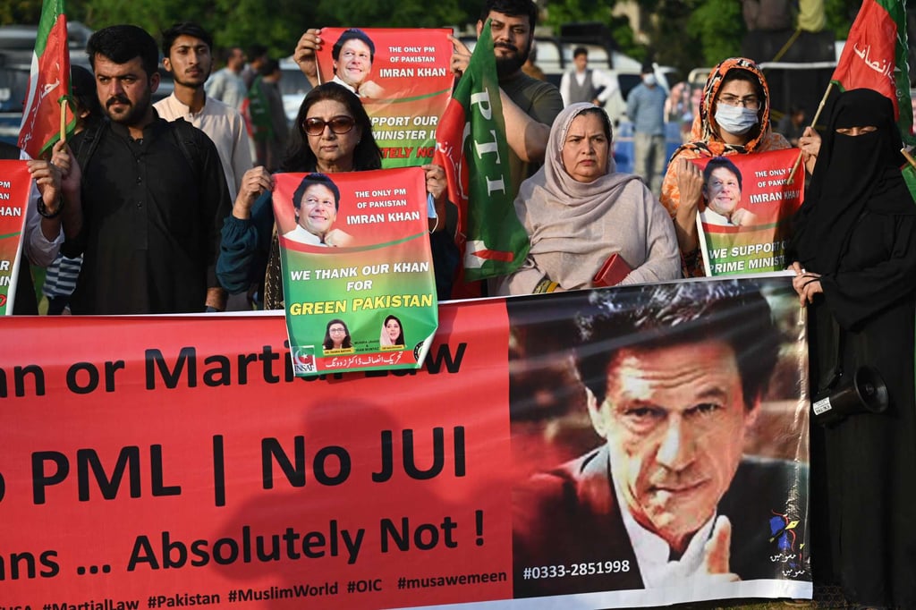 Supporters of Pakistan’s Prime Minister Imran Khan, who wants them to take to the streets on Sunday ahead of a parliamentary no-confidence vote that could see him thrown out of office. Photo: AFP Supporters of Pakistan’s Prime Minister Imran Khan, who wants them to take to the streets on Sunday ahead of a parliamentary no-confidence vote that could see him thrown out of office. Photo: AFP