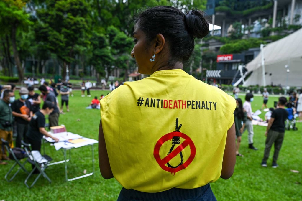 An activist wears a T-shirt with a sign protesting against the death penalty. Photo: AFP An activist wears a T-shirt with a sign protesting against the death penalty. Photo: AFP