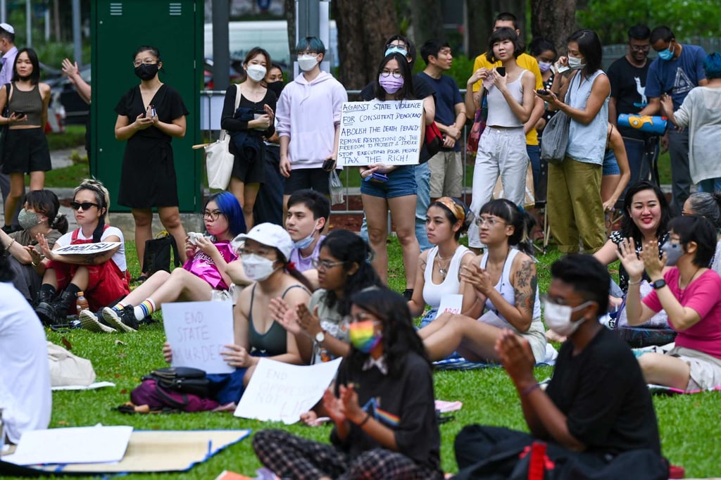 Attendees hold signs during a protest against the death penalty at Speakers’ Corner in Singapore. Photo: AFP Attendees hold signs during a protest against the death penalty at Speakers’ Corner in Singapore. Photo: AFP