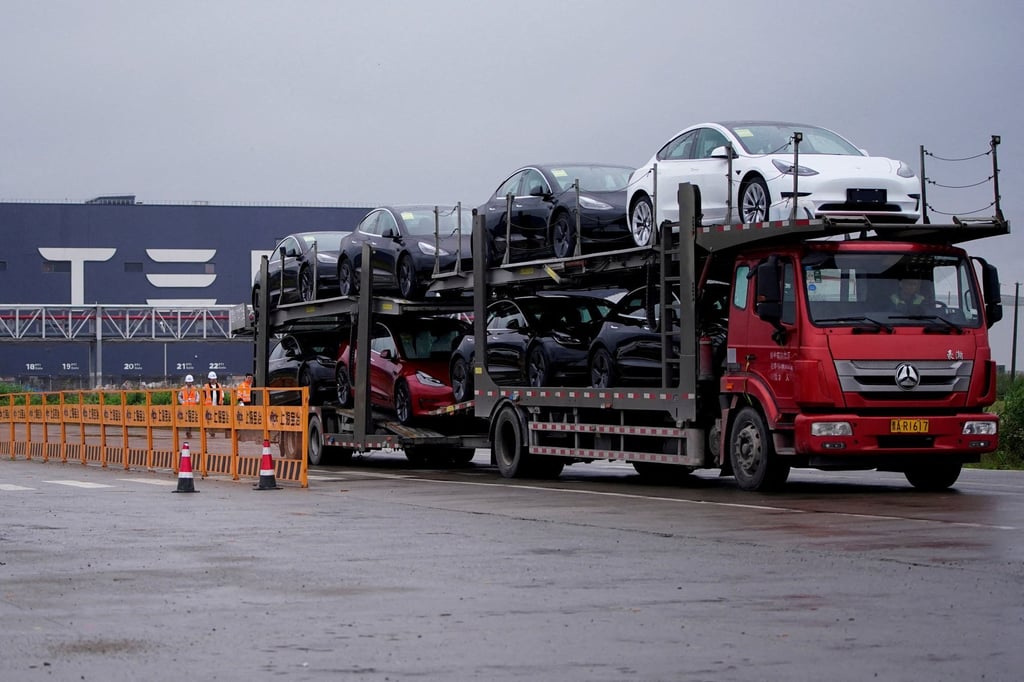 A truck transporting new Tesla cars from its factory in Shanghai in May 2021. Photo: Reuters