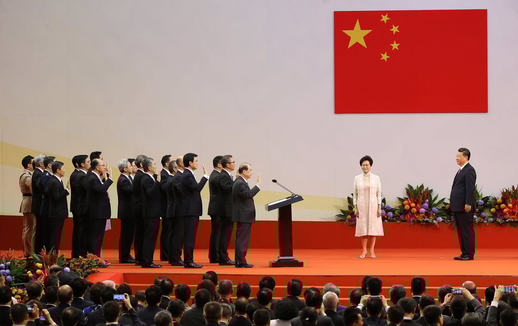 Chinese President Xi Jinping (right) officiates at the swearing-in ceremony for Hong Kong’s top officials, with Chief Executive Carrie Lam watching, on July 1, 2017. Photo: Sam Tsang
