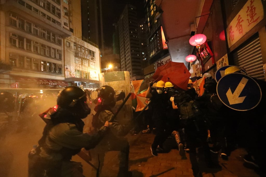 The 13 were among 15 defendants sentenced at West Kowloon Court on Wednesday for their role in the incident which occurred in Sheung Wan on July 28, 2019. Photo: Felix Wong