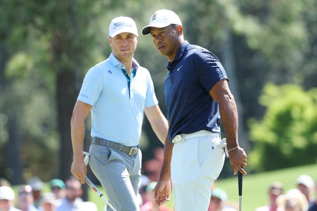 Tiger Woods and Justin Thomas look on from the first green during a practice round at Augusta National. Photo: TNS Tiger Woods and Justin Thomas look on from the first green during a practice round at Augusta National. Photo: TNS