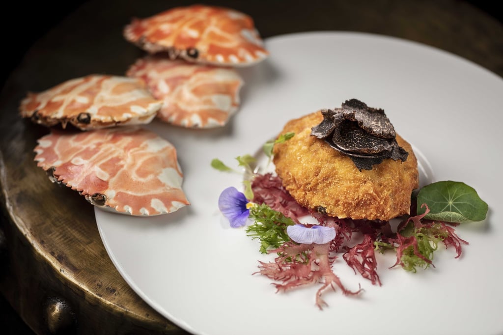 Jade Dragon’s baked crabmeat, truffle, mushroom in a shell. Photo: Forbes Conrad