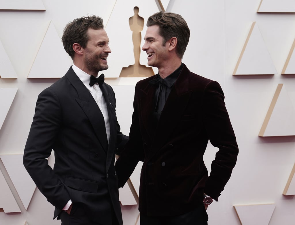 Jamie Dornan and Andrew Garfield arrive at the Oscars on March 27, in Los Angeles. Photo: AP