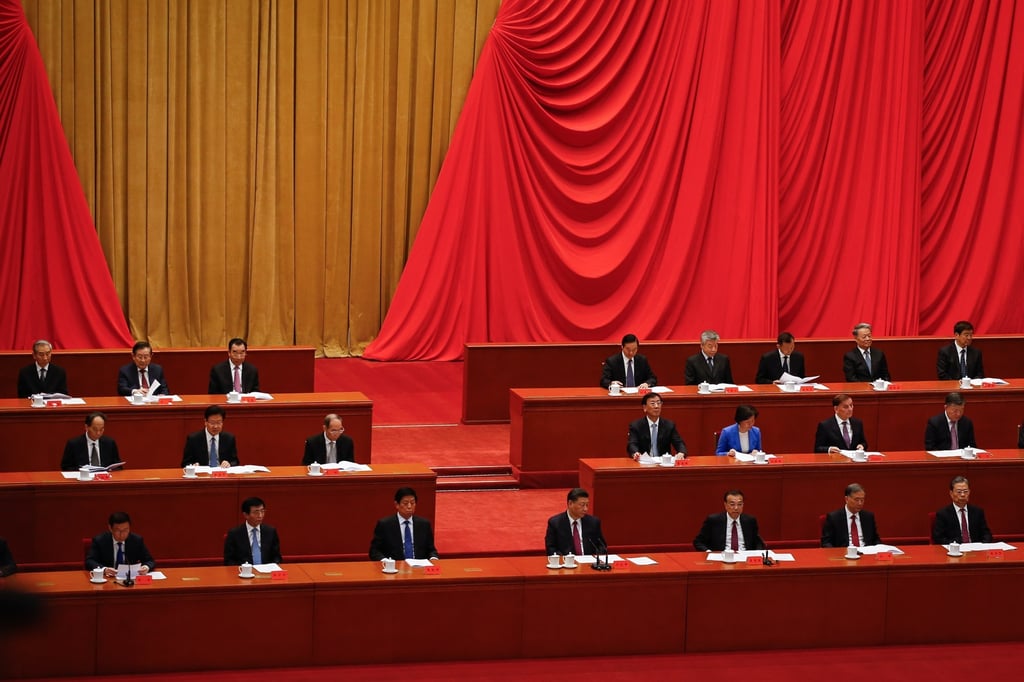 Chinese President Xi Jinping, centre, and other officials at a commendation ceremony inside the Great Hall of the People. Finding the right person with direct access to decision makers can be difficult. Photo: EPA-EFE