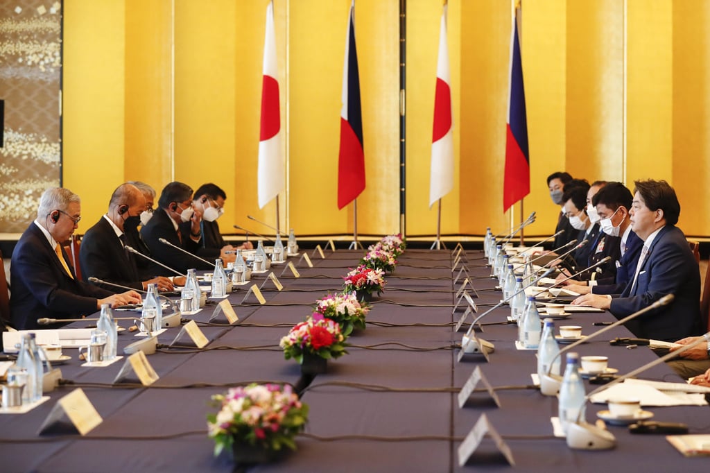 Japanese Foreign Minister Yoshimasa Hayashi, right, with Defence Minister Nobuo Kishi, speaks to Philippine Foreign Secretary Teodoro Locsin Jnr, left, and Defence Secretary Delfin Lorenzana, second left, during a meeting in Tokyo on Saturday. Photo: Pool via AP