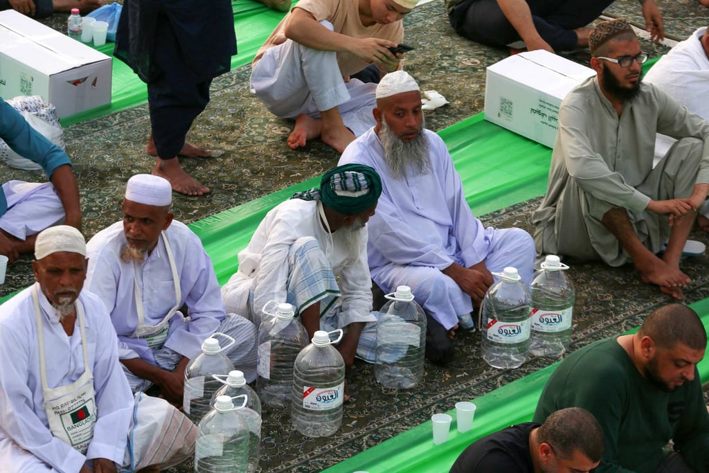 Muslims gather for prayer at the Grand Mosque complex in the holy Saudi city of Mecca on April 9. Photo: AFP
