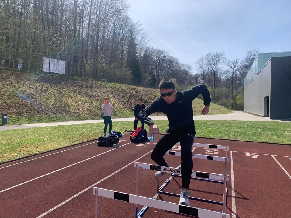 Cheung Wang-fung in training with Vera Lui in the background. Photo: HKAAA