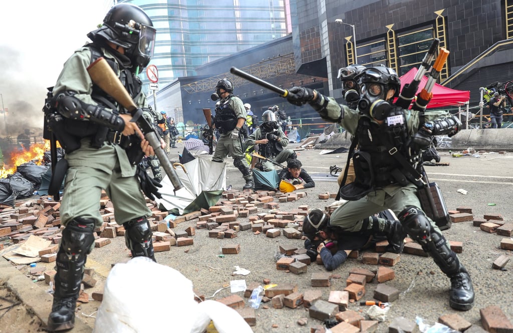 Clashes between protesters and riot police at Polytechnic University in November 2019. Photo: Sam Tsang Clashes between protesters and riot police at Polytechnic University in November 2019. Photo: Sam Tsang