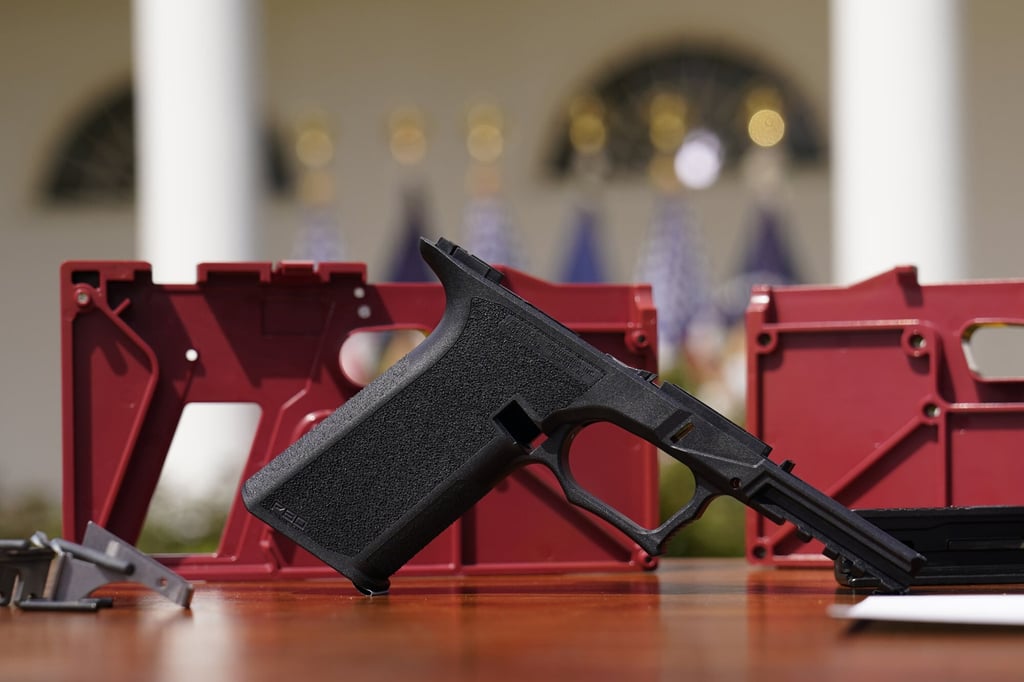 A 9mm pistol build kit with a commercial slide and barrel with a polymer frame is displayed in the Rose Garden of the White House on Monday. Photo: AP