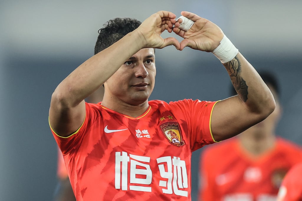 Elkeson – or Ai Kesen – celebrates a goal for Guangzhou Evergrande Taobao against Dalian Pro in 2020. Photo: Xinhua/Pan Yulong Elkeson – or Ai Kesen – celebrates a goal for Guangzhou Evergrande Taobao against Dalian Pro in 2020. Photo: Xinhua/Pan Yulong