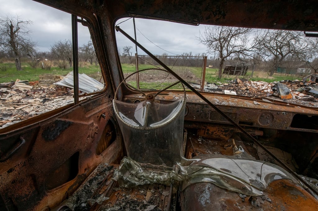 A view of a car destroyed by a military strike, during Russia’s invasion in the village of Kukhari, in Kyiv region on Saturday. Photo: Reuters