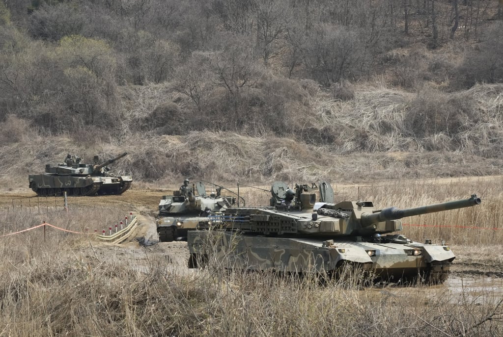 South Korea Army’s K1A1 tanks move during a military exercise in Paju, near the border with North Korea, South Korea on April 5. Photo: AP South Korea Army’s K1A1 tanks move during a military exercise in Paju, near the border with North Korea, South Korea on April 5. Photo: AP