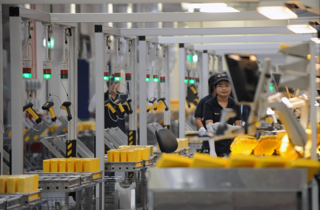 A solar panels manufacturing facility; Singapore is attempting to accelerate its use of renewables. Photo: AFP A solar panels manufacturing facility; Singapore is attempting to accelerate its use of renewables. Photo: AFP