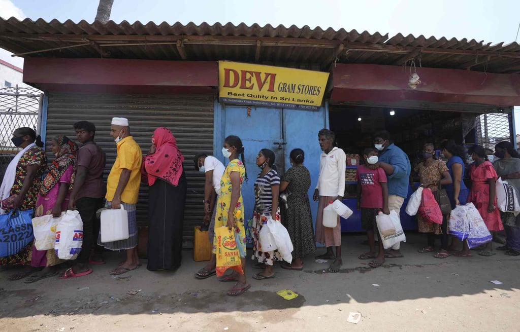 Sri Lankans queue up to purchase kerosene oil earlier this month amid the island nation’s fuel shortage. Photo: AP