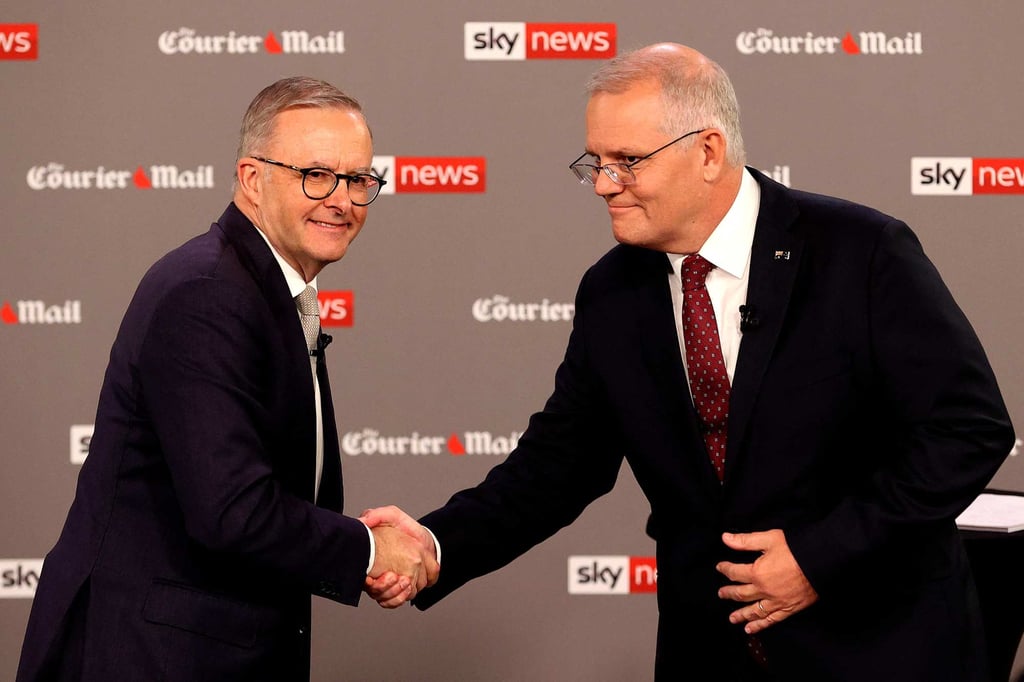 Australian Prime Minister Scott Morrison, right, shakes hands with the leader of the opposition, Anthony Albanese, during the first leaders’ debate of the 2022 federal election campaign. Photo: AFP Australian Prime Minister Scott Morrison, right, shakes hands with the leader of the opposition, Anthony Albanese, during the first leaders’ debate of the 2022 federal election campaign. Photo: AFP
