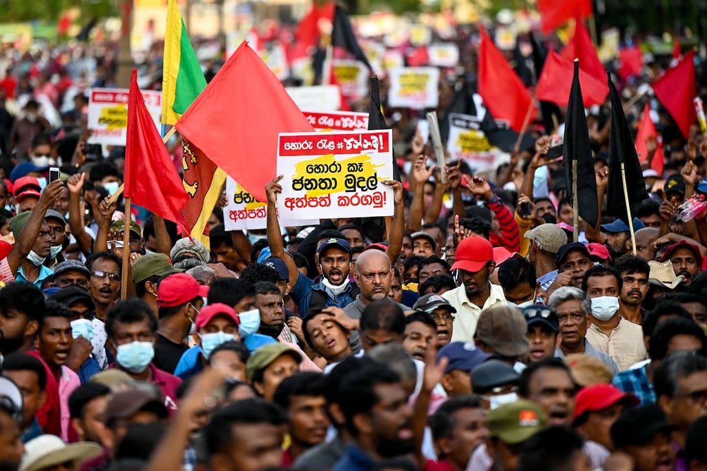 Protesters shout anti-government slogans during a demonstration in Colombo on Tuesday, demanding President Gotabaya Rajapaksa’s resignation over the country’s crippling economic crisis. Photo: AFP
