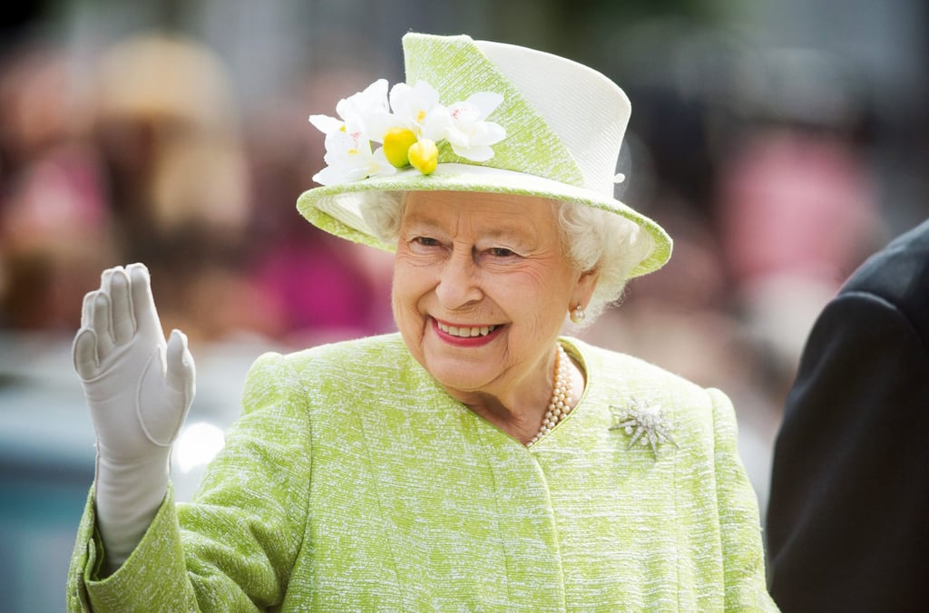 The real Queen Elizabeth II waves during a walk about around Windsor, England. Photo: WireImage