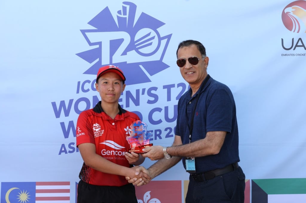 Hong Kong Cricket Team captain Kary Chan receives her player of the match award in Dubai.