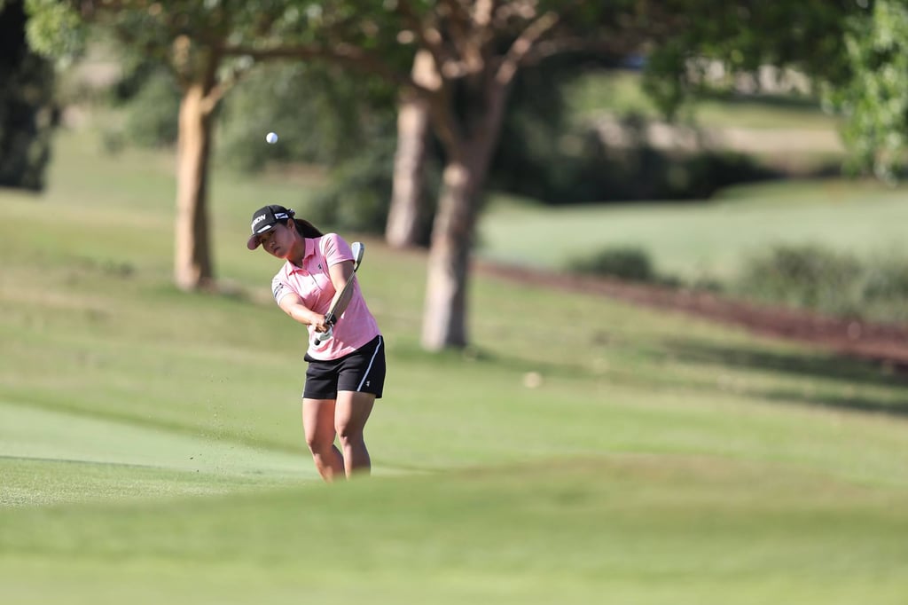 Nasa Hataoka of Japan chips on the 13th hole during the final round of the LA Open. Photo: AFP