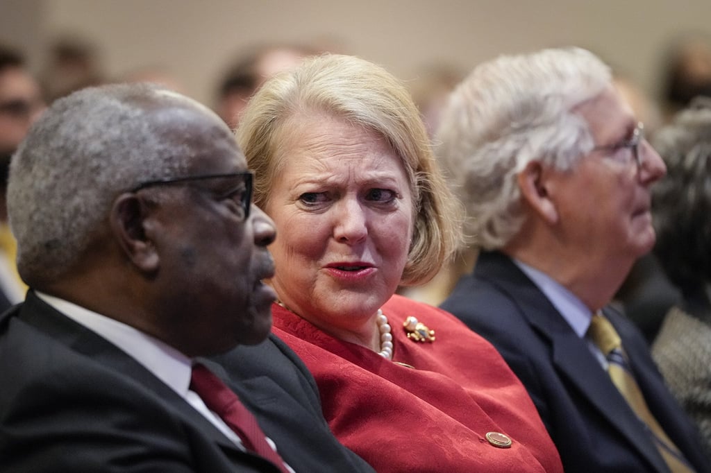 Associate Supreme Court Justice Clarence Thomas sits with his wife and conservative activist Virginia Thomas while he waits to speak at the Heritage Foundation in October 21, 2021, in Washington DC. Photo: Getty Images/TNS