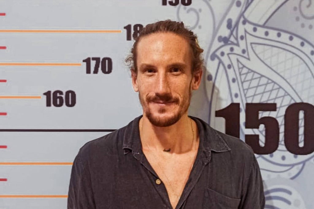 Canadian tourist Jeffrey Craigen is facing deportation from Bali after a video of him dancing naked on top of a sacred mountain went viral. Photo: AFP