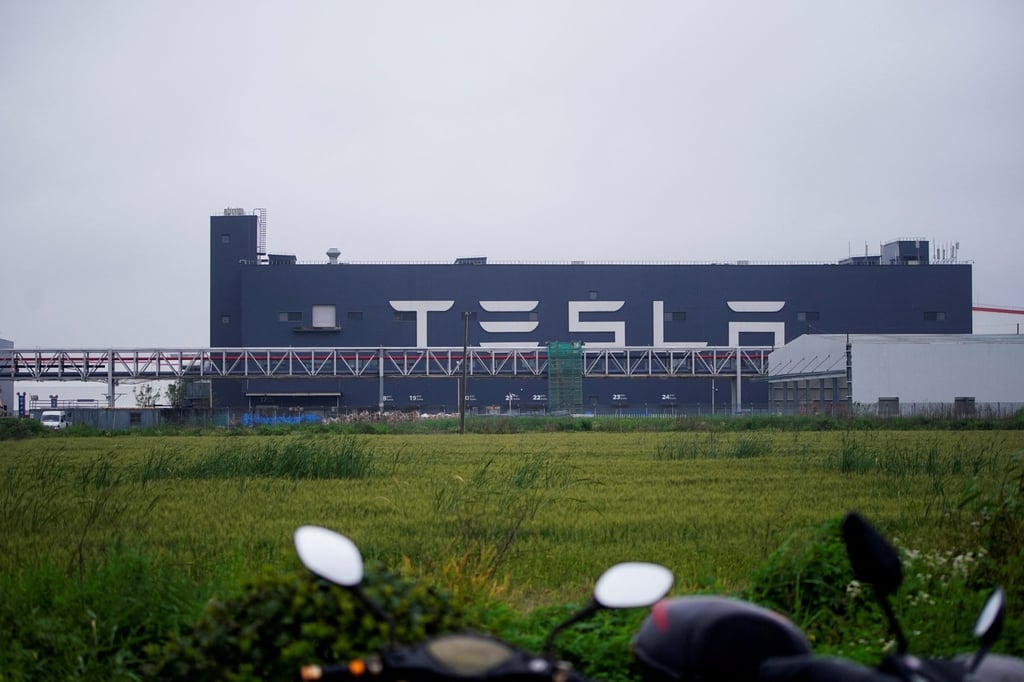 A Tesla sign is seen at its factory in Shanghai, China, May 13, 2021. Photo: Reuters A Tesla sign is seen at its factory in Shanghai, China, May 13, 2021. Photo: Reuters