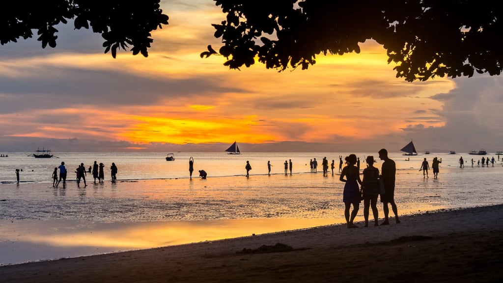 Sunset on Boracay. Pent-up demand for travel saw the Philippine holiday island exceed its visitor quota over Easter. Photo: Shutterstock
