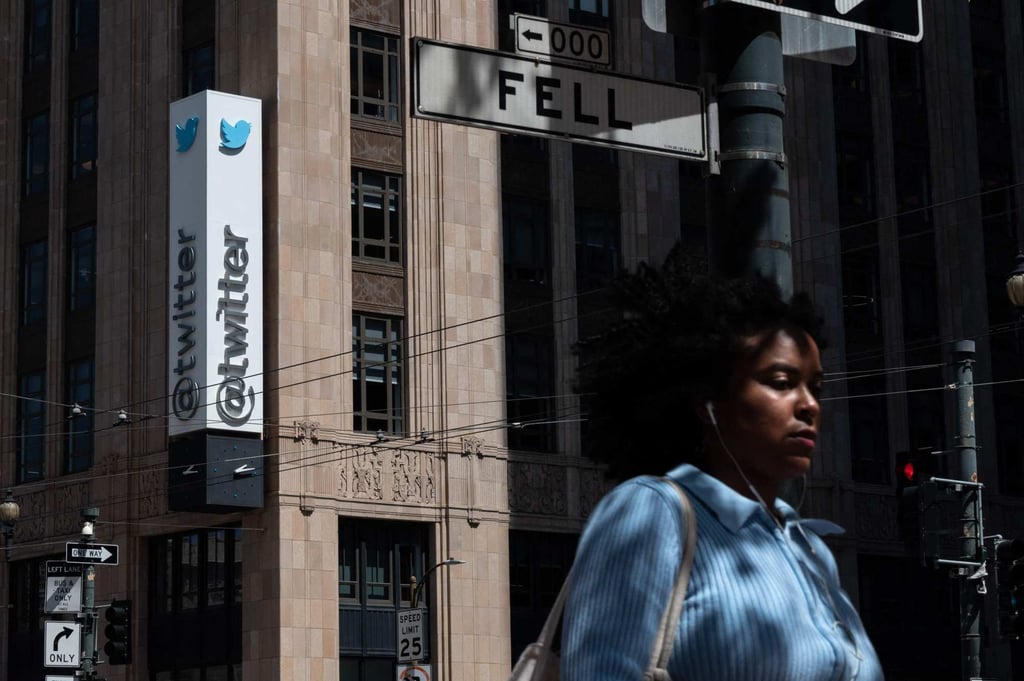 A person walks past the Twitter headquarters in downtown San Francisco, California. Photo: AFP
