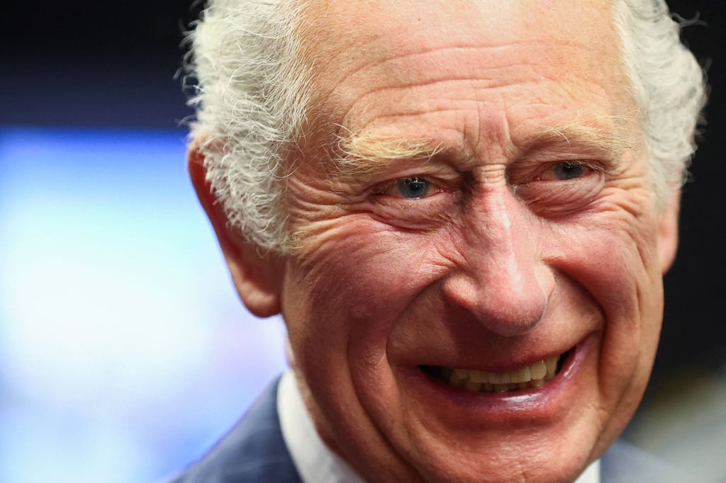 Britain’s Prince Charles called the cow mask device ‘fascinating’ at an exhibition showcasing the designs. Photo: AFP Britain’s Prince Charles called the cow mask device ‘fascinating’ at an exhibition showcasing the designs. Photo: AFP