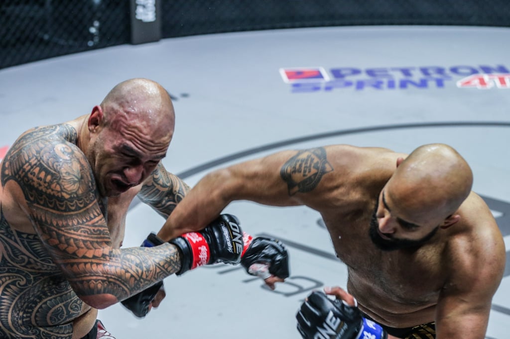 Arjan Bhullar lands an overhand right on Brandon Vera. Photo: ONE Championship.
